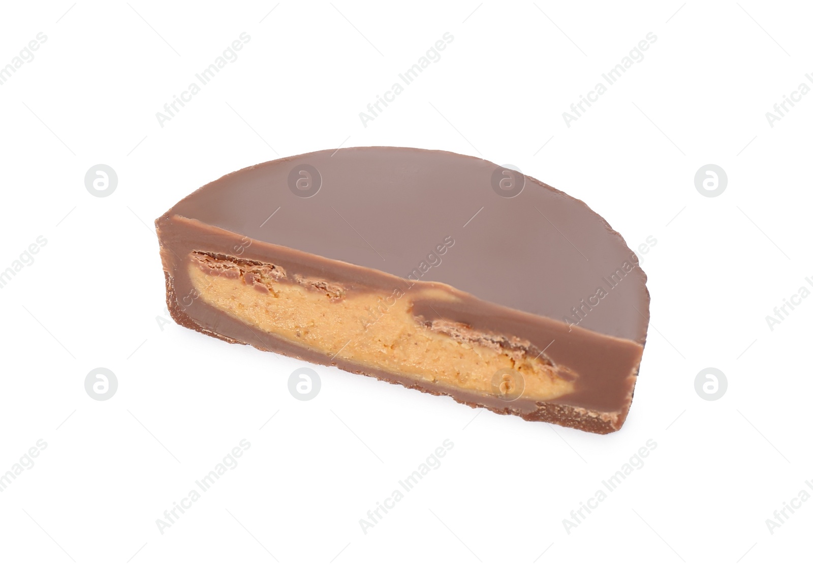 Photo of Cut delicious peanut butter cup isolated on white