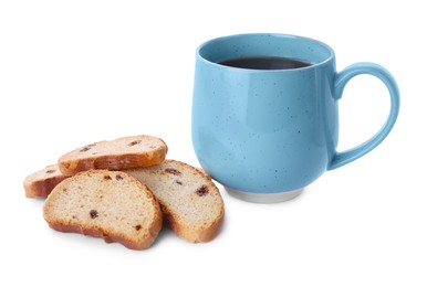 Sweet hard chuck crackers with raisins and cup of tea on white background