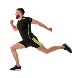 Photo of Young man in sportswear running on white background