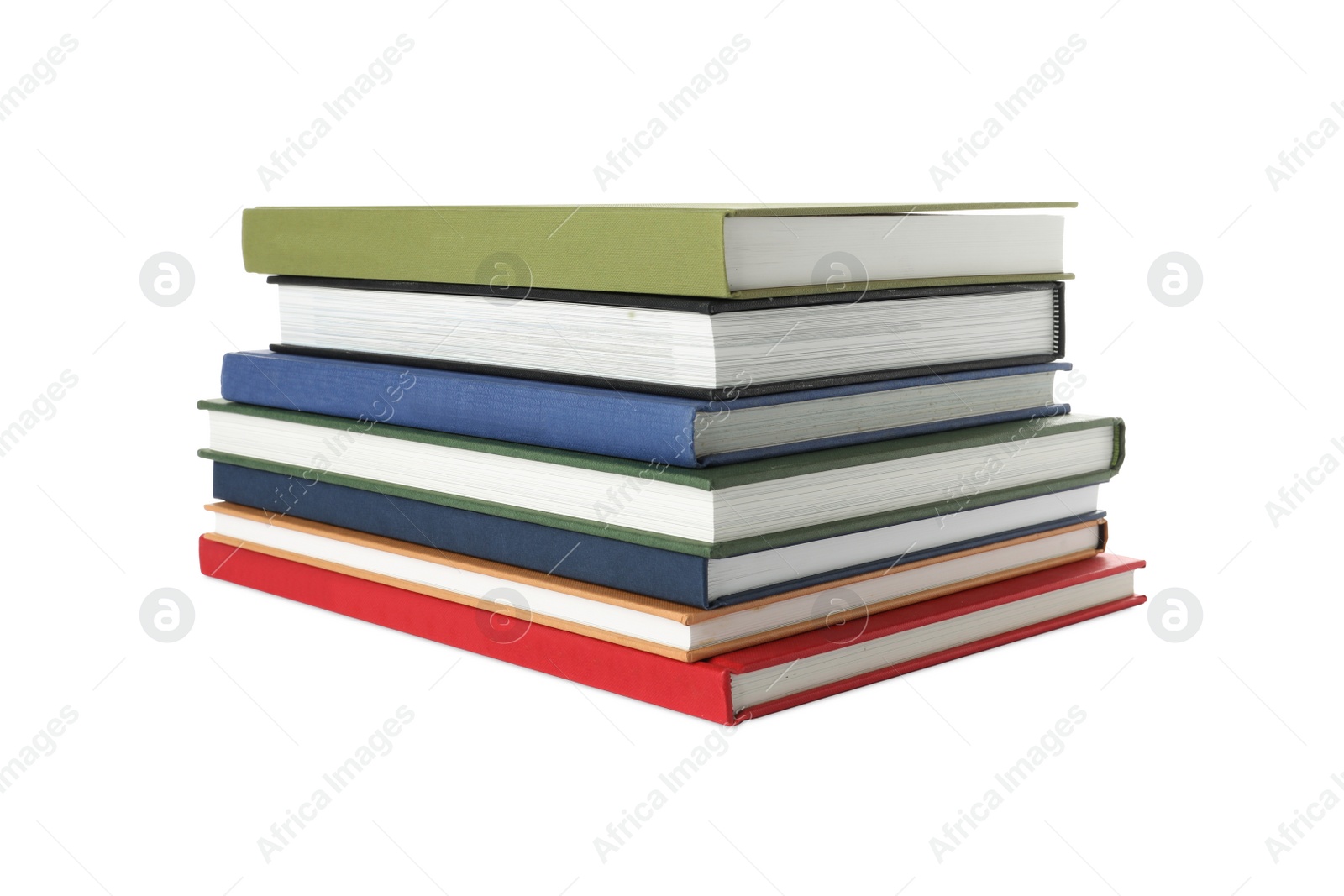 Photo of Many different books stacked on white background