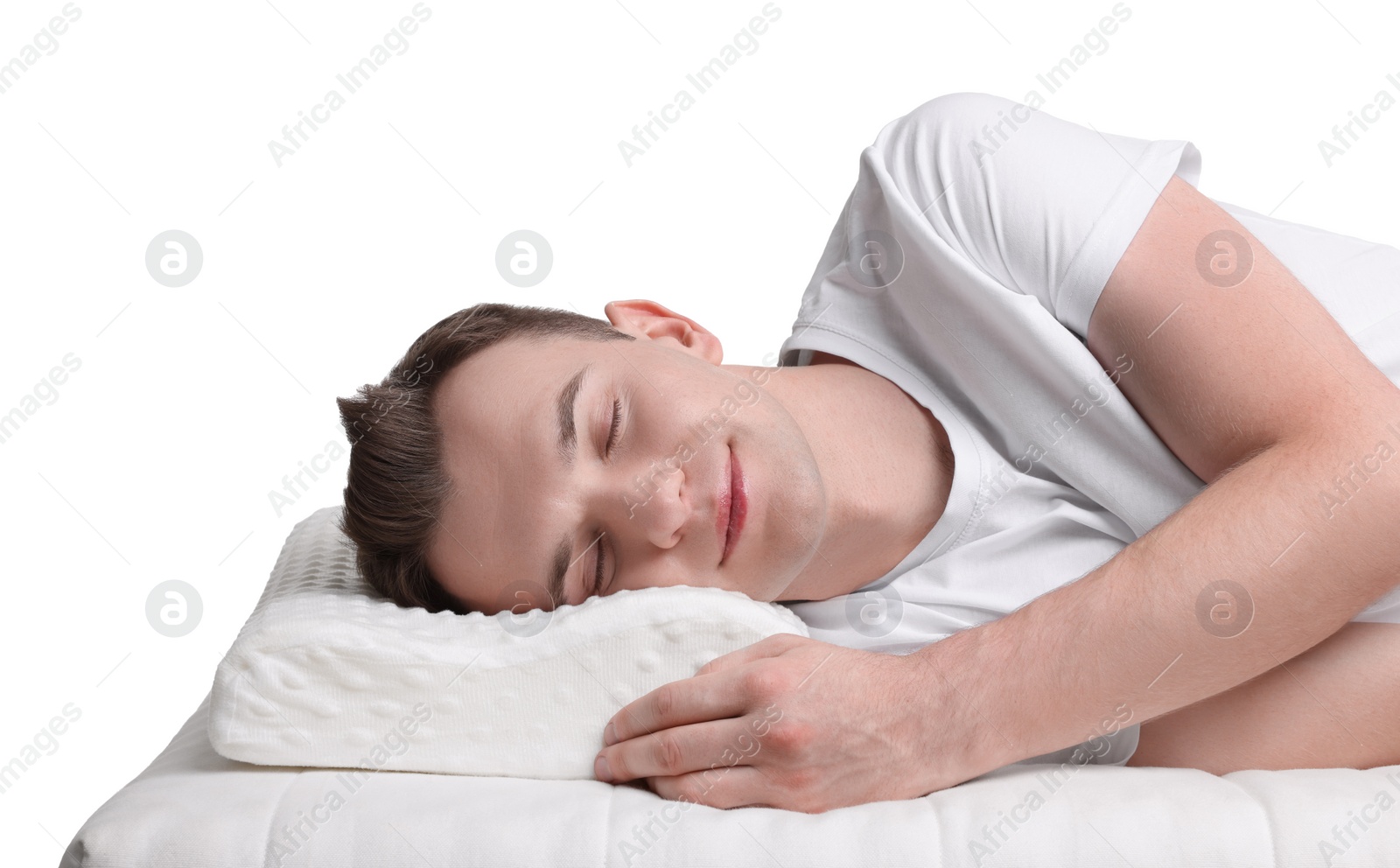 Photo of Man sleeping on orthopedic pillow against white background