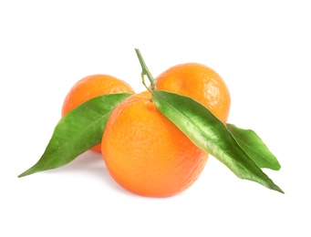 Tasty ripe tangerines with leaves on white background