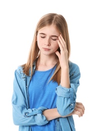 Teenage girl suffering from headache on white background