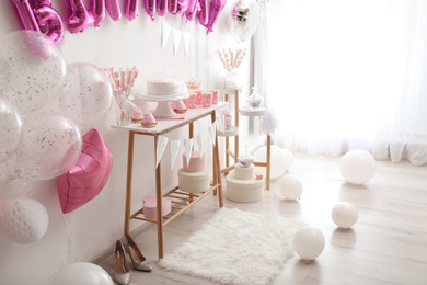 Photo of Room decorated with balloons for birthday party