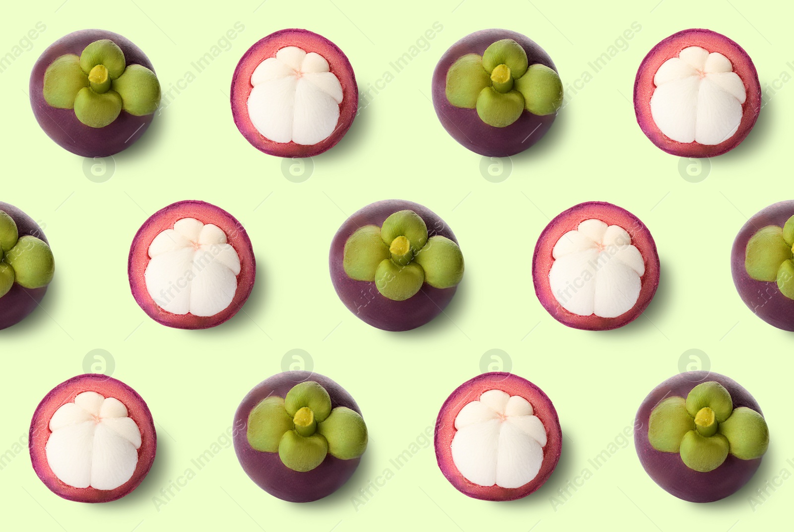 Image of Delicious mangosteens on light green background, flat lay