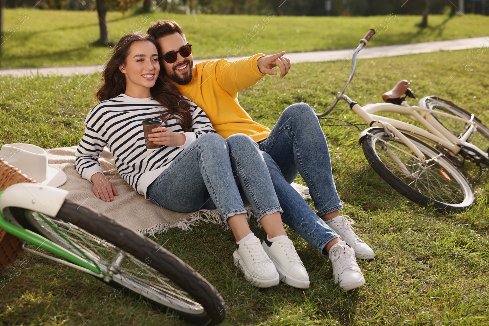 Photo of Beautiful young couple spending time together outdoors