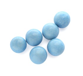 Photo of Bright light blue chewy gumballs isolated on white