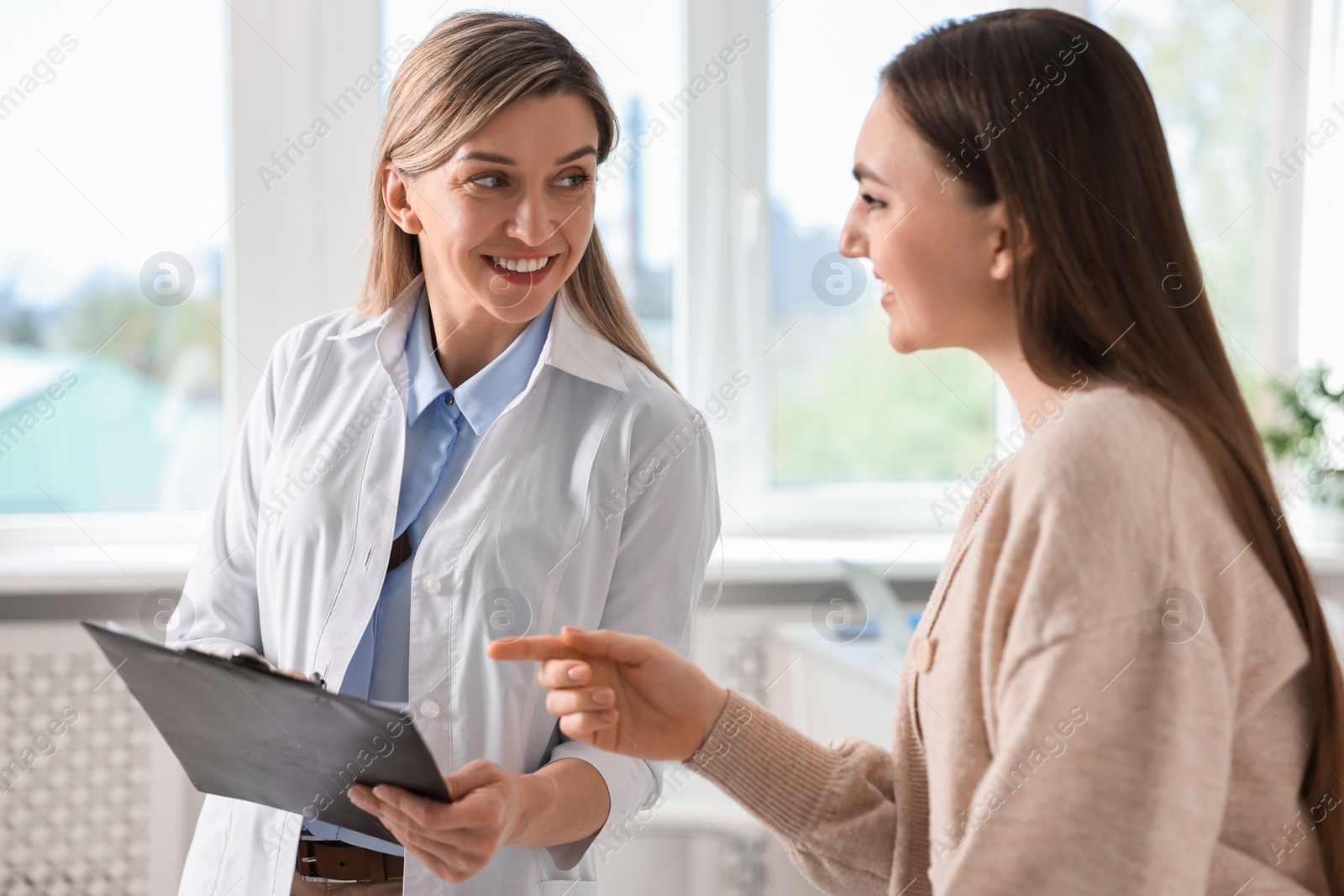 Photo of Professional doctor working with patient in hospital