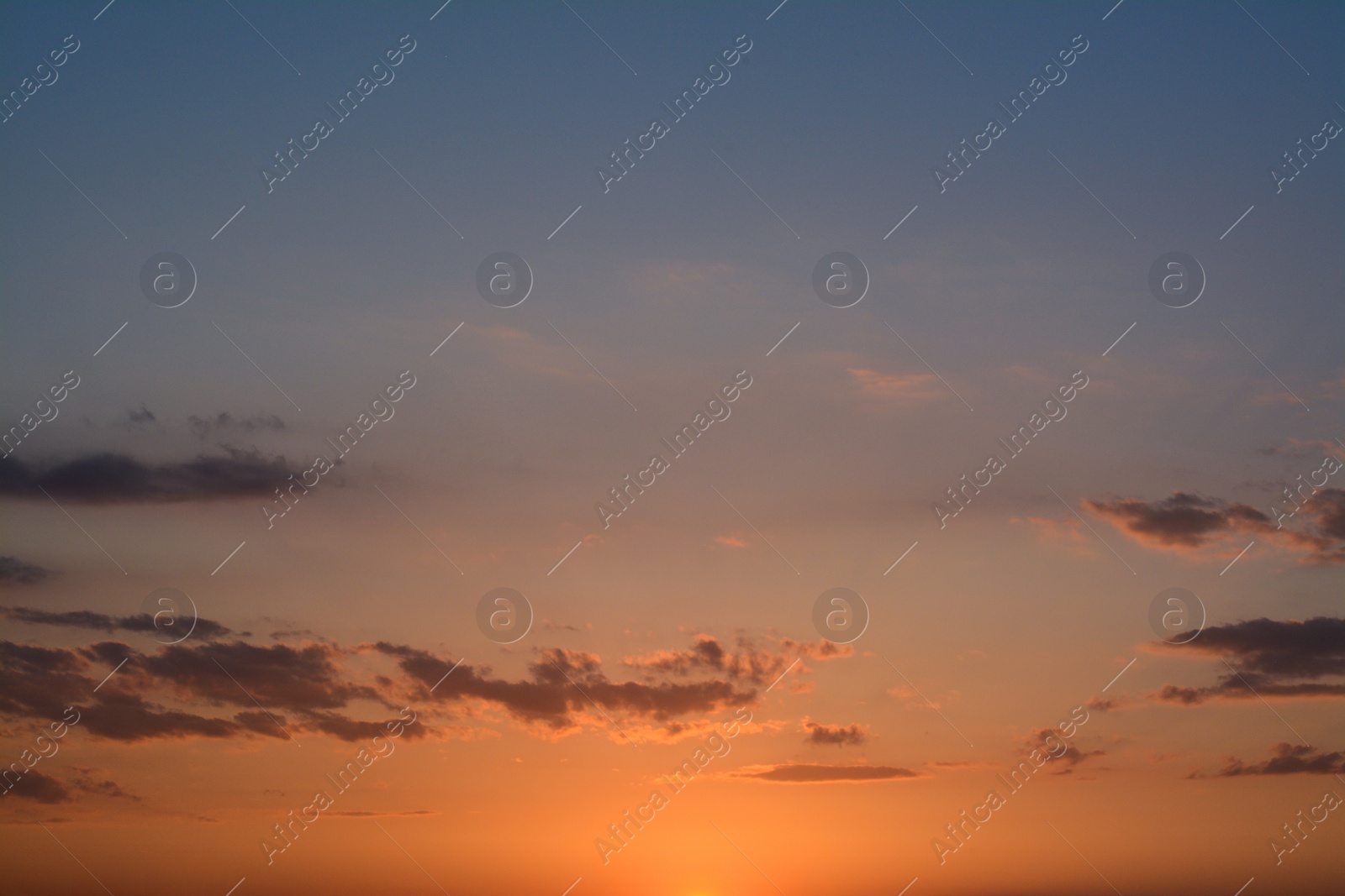 Photo of Picturesque view of beautiful sunset sky with clouds