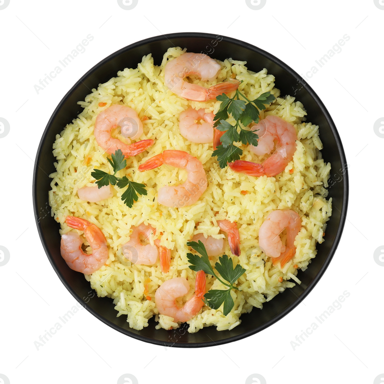 Photo of Delicious risotto with shrimps and parsley in bowl isolated on white, top view