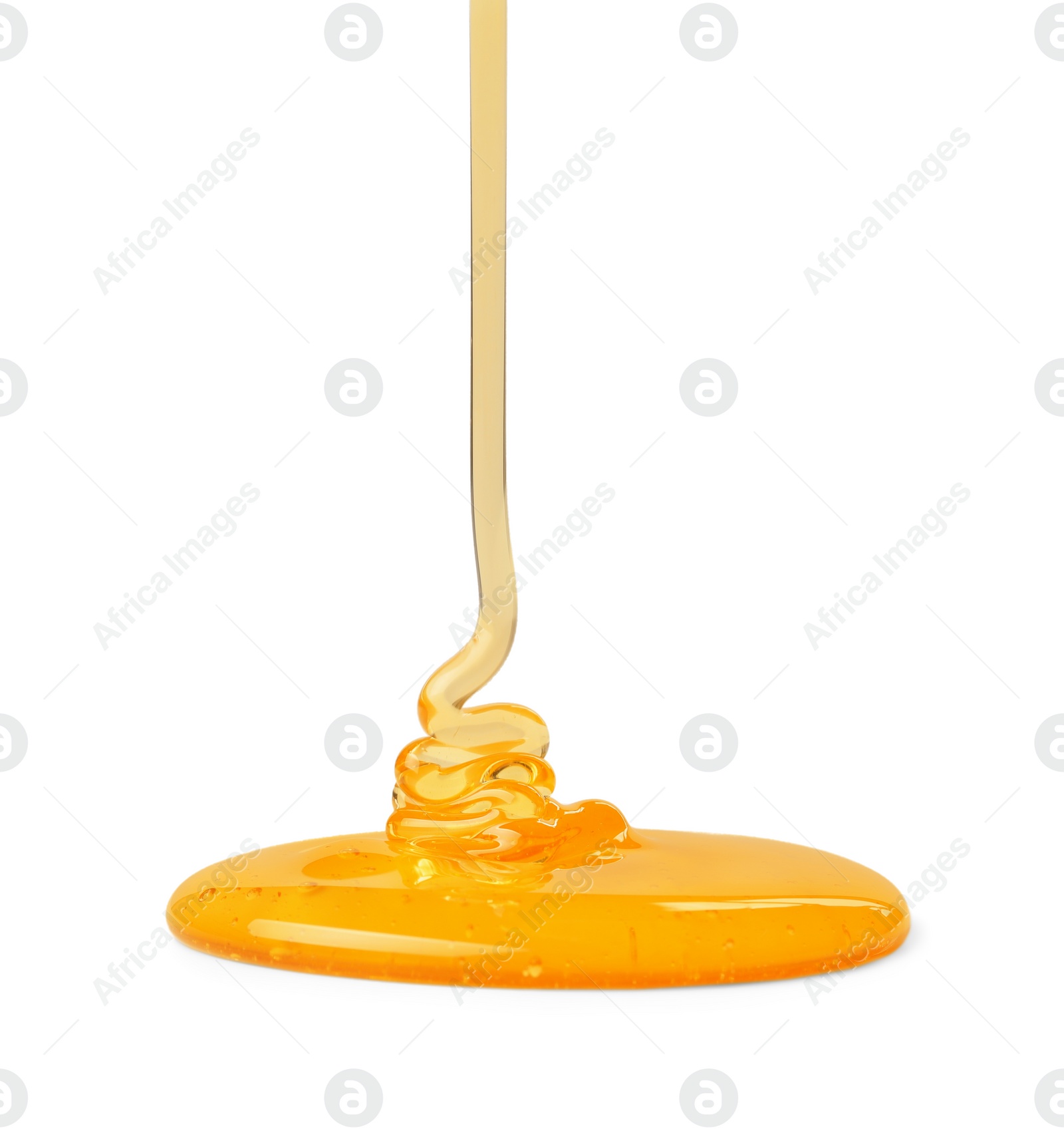 Photo of Pouring tasty natural honey isolated on white