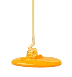 Photo of Pouring tasty natural honey isolated on white