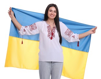Young woman with flag of Ukraine on white background