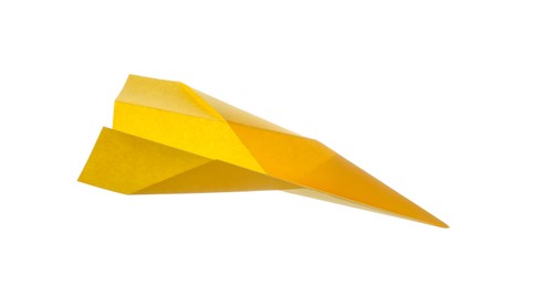 Photo of Handmade yellow paper plane isolated on white