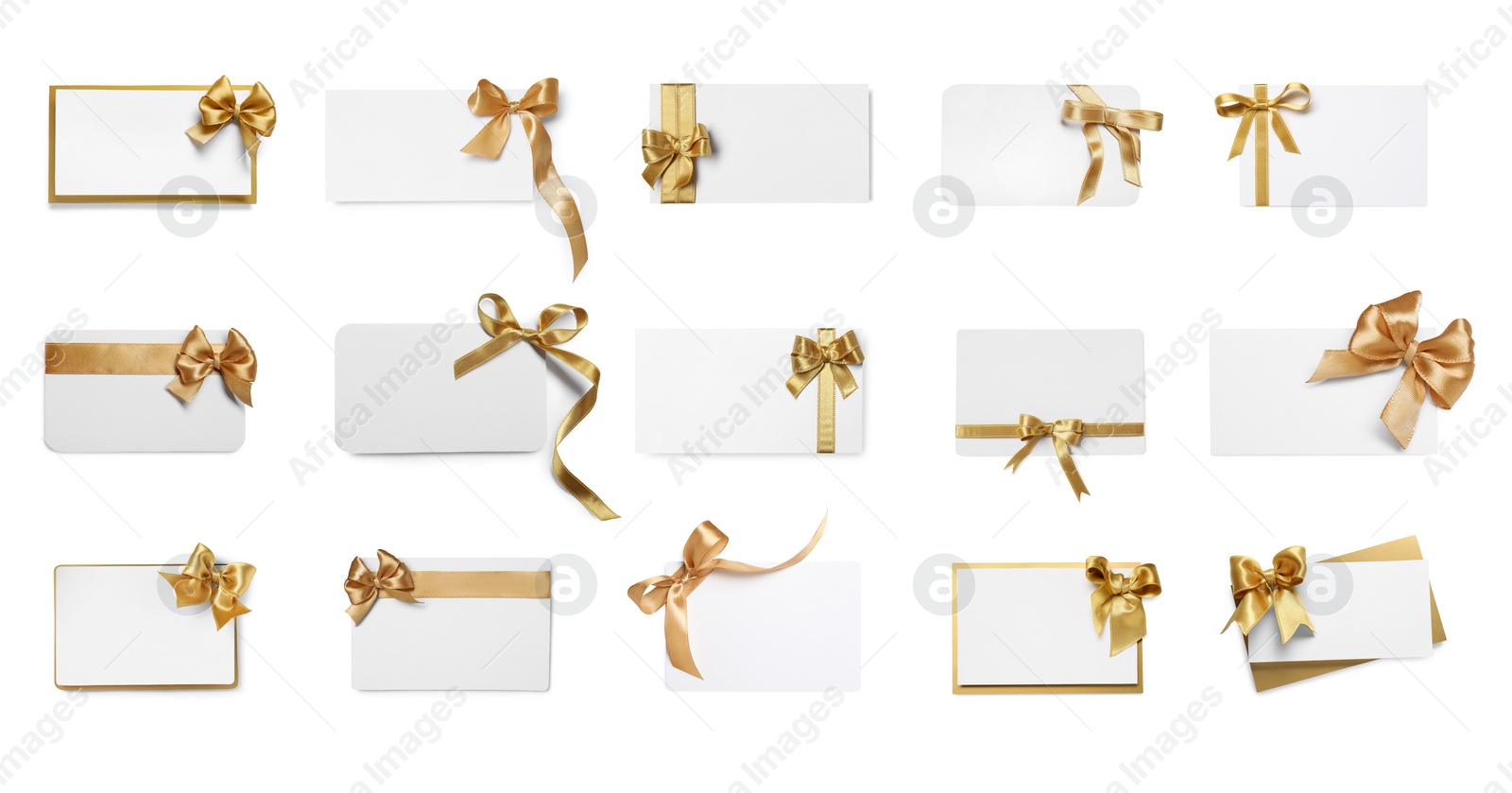 Image of Set of many different gift cards with golden bows on white background, top view