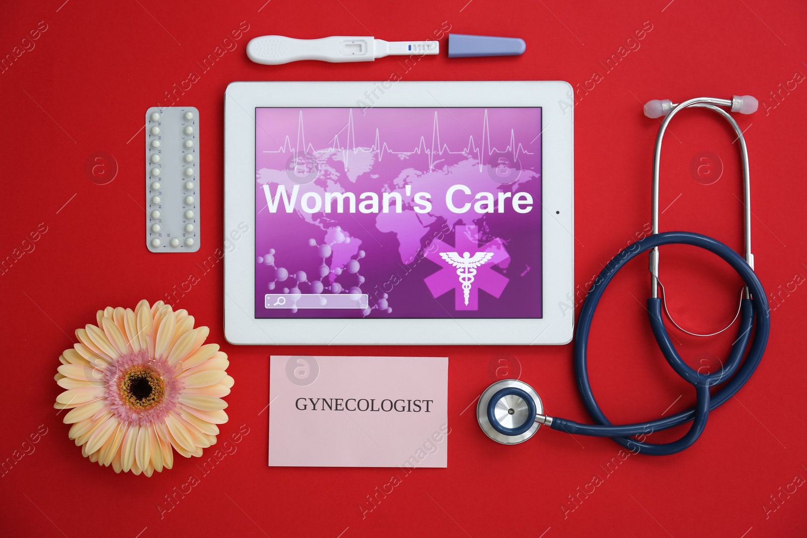 Photo of Flat lay composition with tablet, stethoscope, birth control pills and pregnancy test on color background. Gynecological care