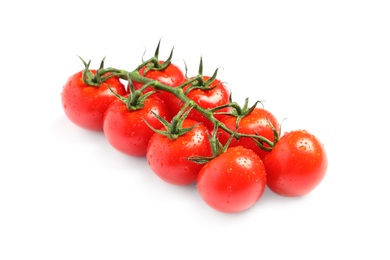 Photo of Branch of fresh cherry tomatoes isolated on white