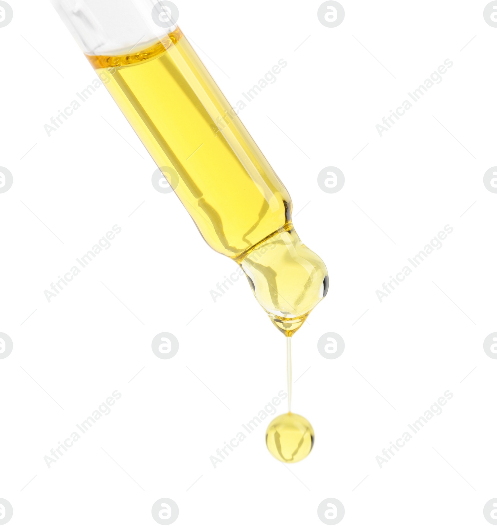 Photo of Dripping tincture from pipette isolated on white