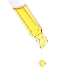 Photo of Dripping tincture from pipette isolated on white