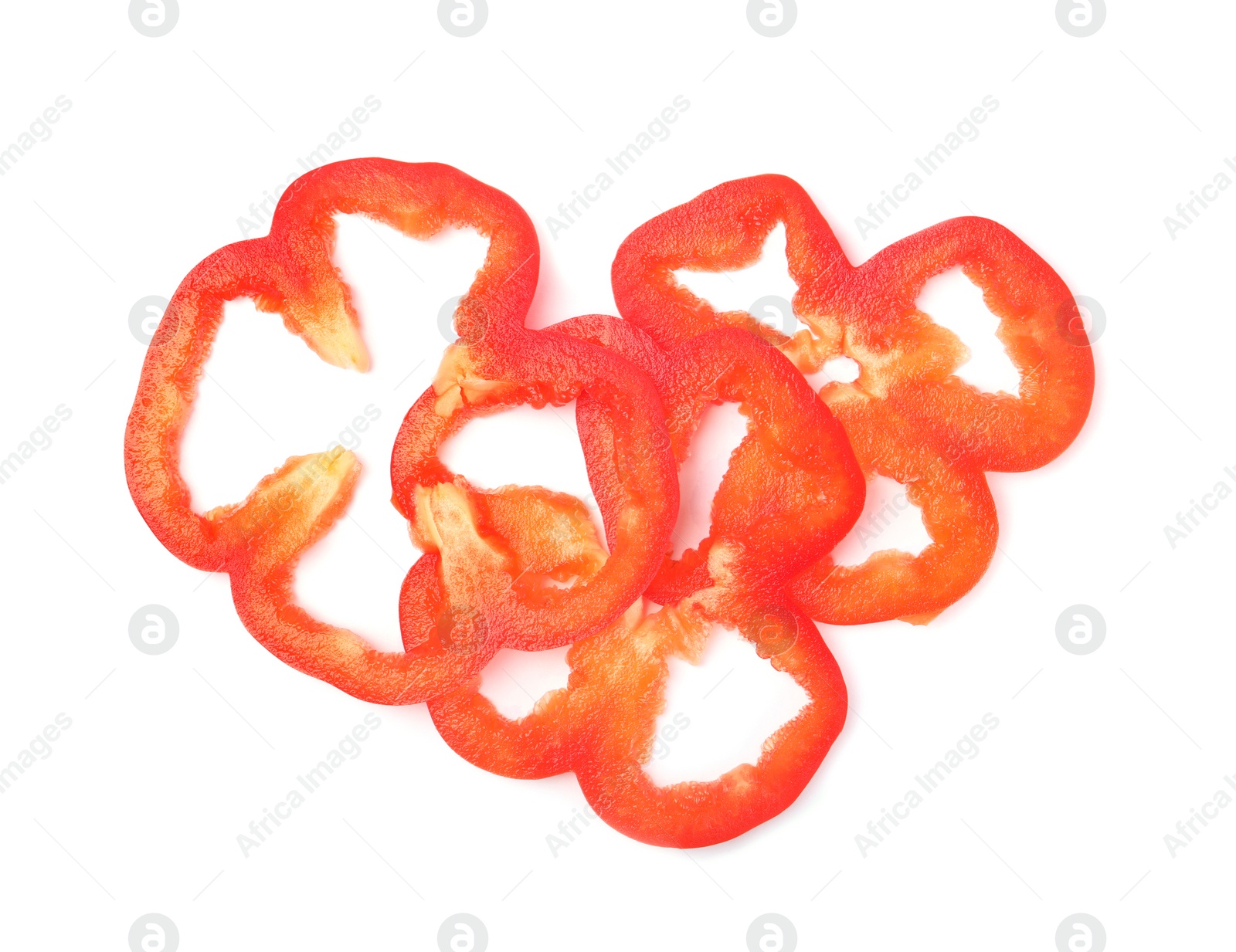 Photo of Slices of red bell pepper on white background, top view