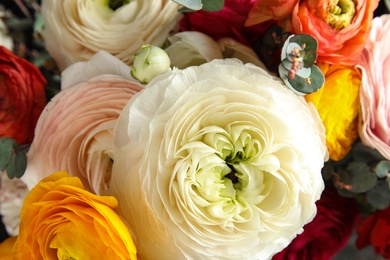 Photo of Beautiful delicate spring ranunculus flowers as background