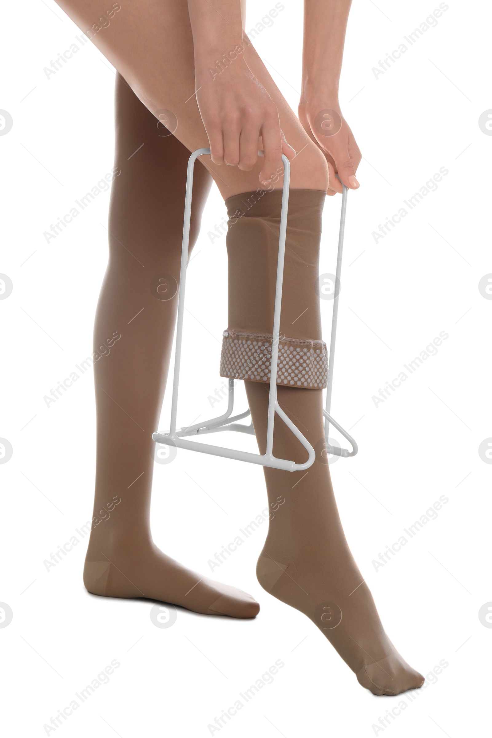 Photo of Woman wearing compression tights with donner on white background, closeup