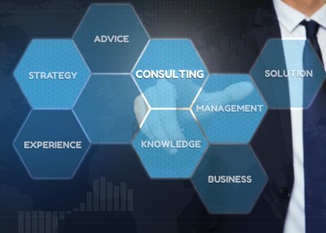 Image of Consulting concept. Man pointing at icons on virtual screen, closeup