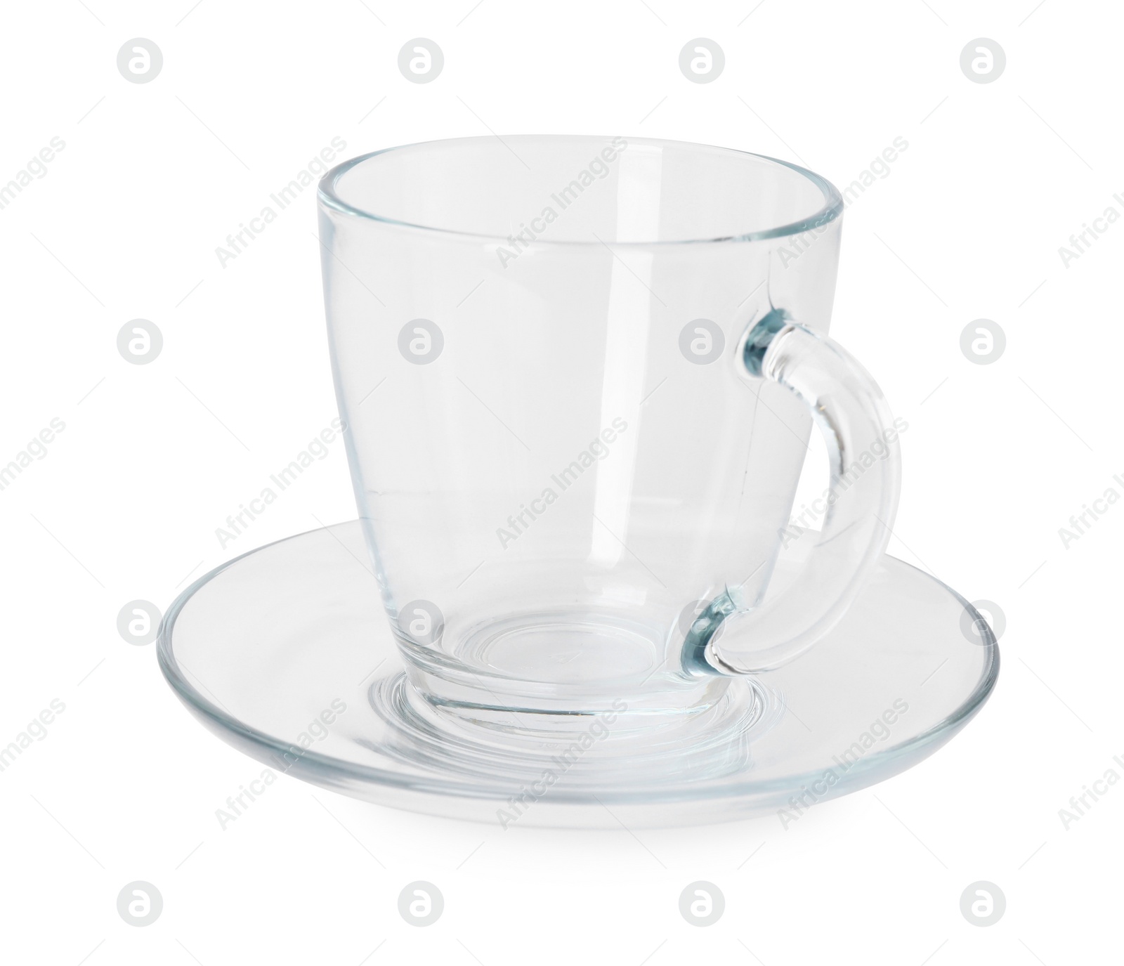 Photo of One clean glass cup and saucer isolated on white