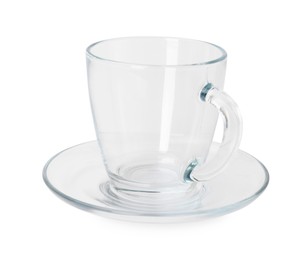 Photo of One clean glass cup and saucer isolated on white