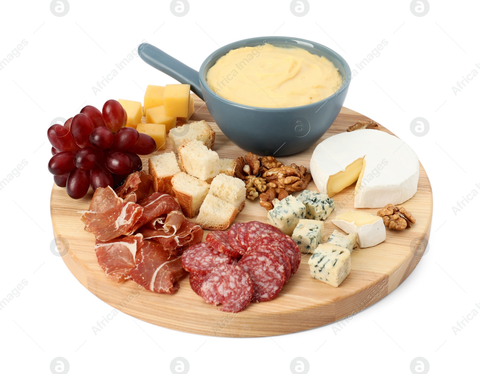 Photo of Fondue with tasty melted cheese and different snacks isolated on white