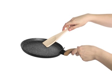 Photo of Woman with spatula and frying pan on white background, closeup