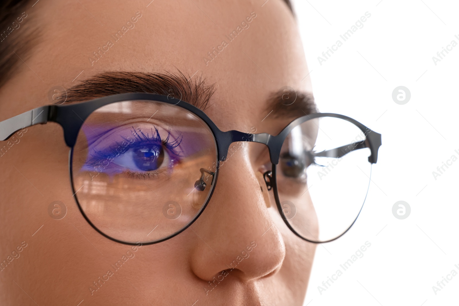 Photo of Woman wearing glasses on blurred background, closeup