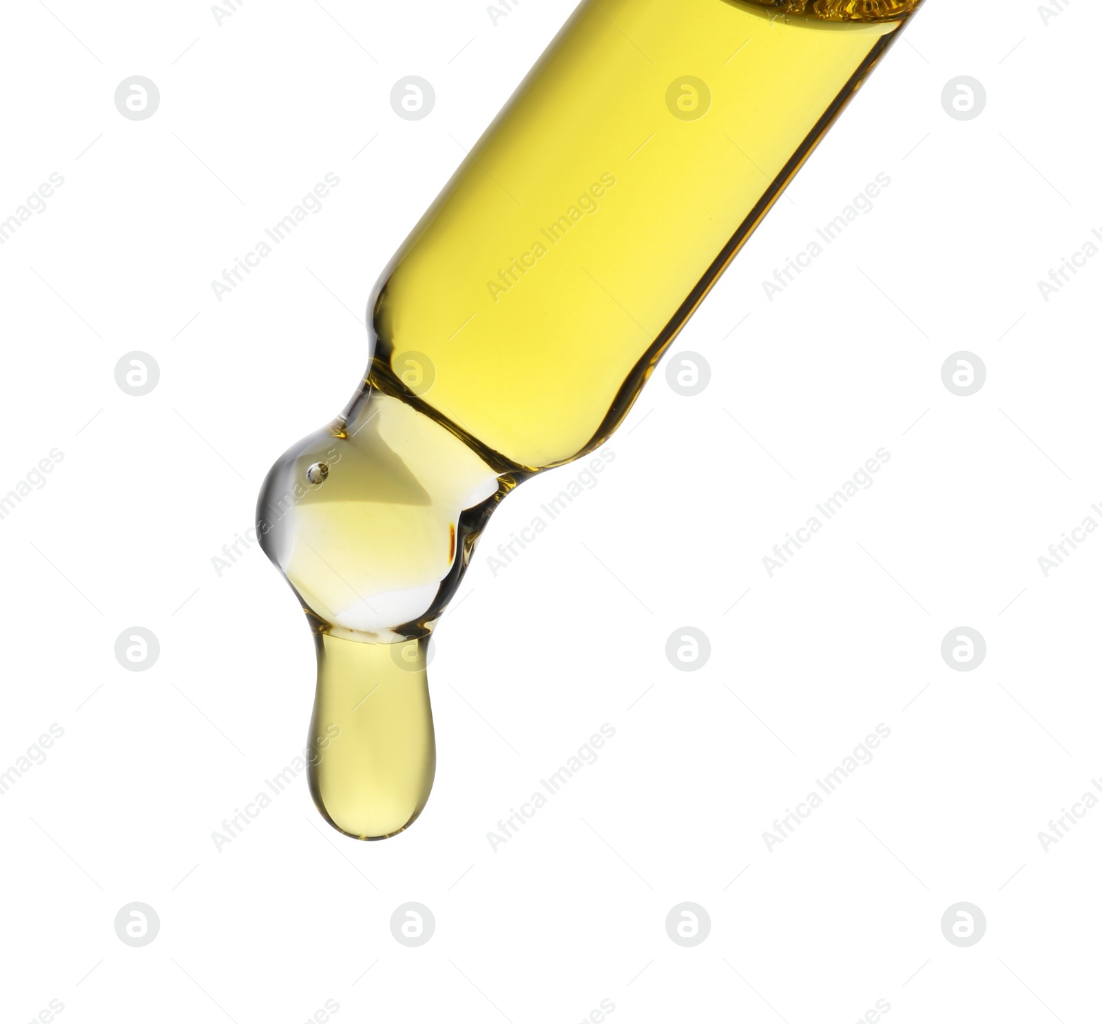 Photo of Dripping tincture from pipette isolated on white