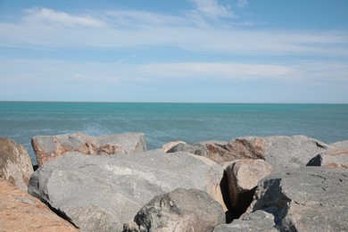 Picturesque view of beautiful rocky seacoast on sunny day