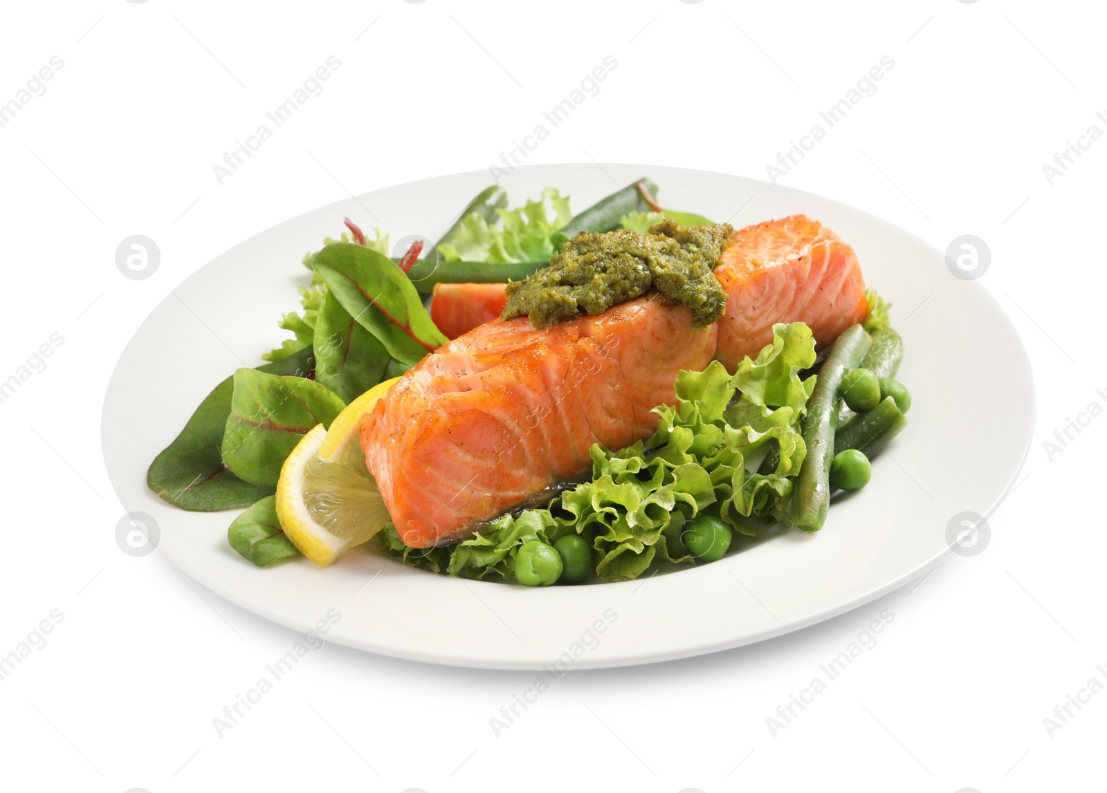 Photo of Tasty cooked salmon with pesto sauce and fresh salad on white background