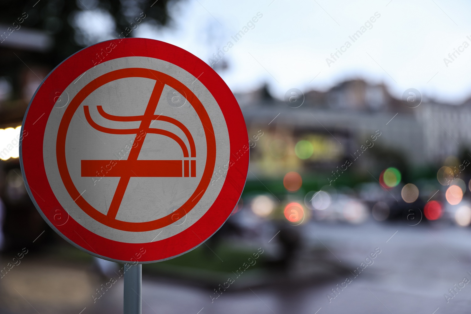 Image of Sign No Smoking on city street, space for text