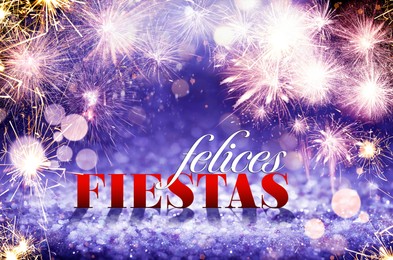 Image of Felices Fiestas. Festive greeting card with happy holiday's wishes in Spanish on bright background