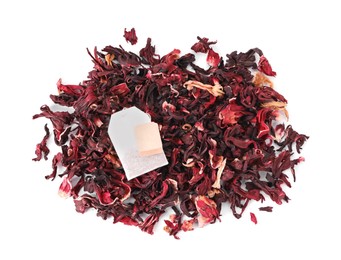 Photo of Pile and bag of dry hibiscus tea isolated on white
