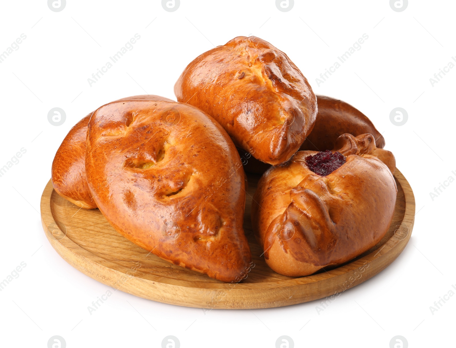 Photo of Wooden board with delicious baked patties on white background