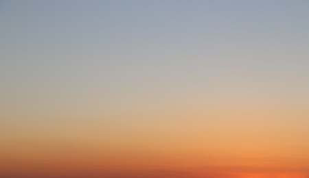 Landscape of city against sky at sunset