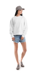 Photo of Full length portrait of young woman in sweater isolated on white. Mock up for design