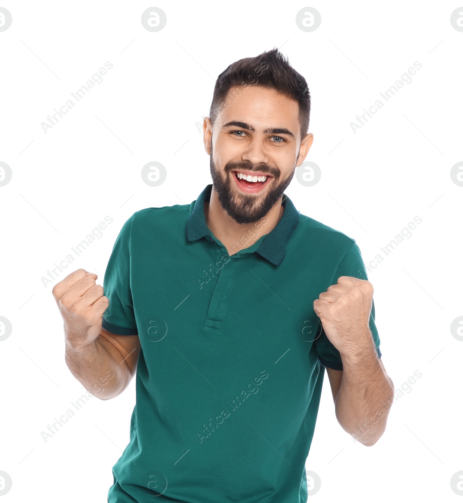 Photo of Happy young man celebrating victory on white background
