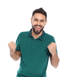 Photo of Happy young man celebrating victory on white background