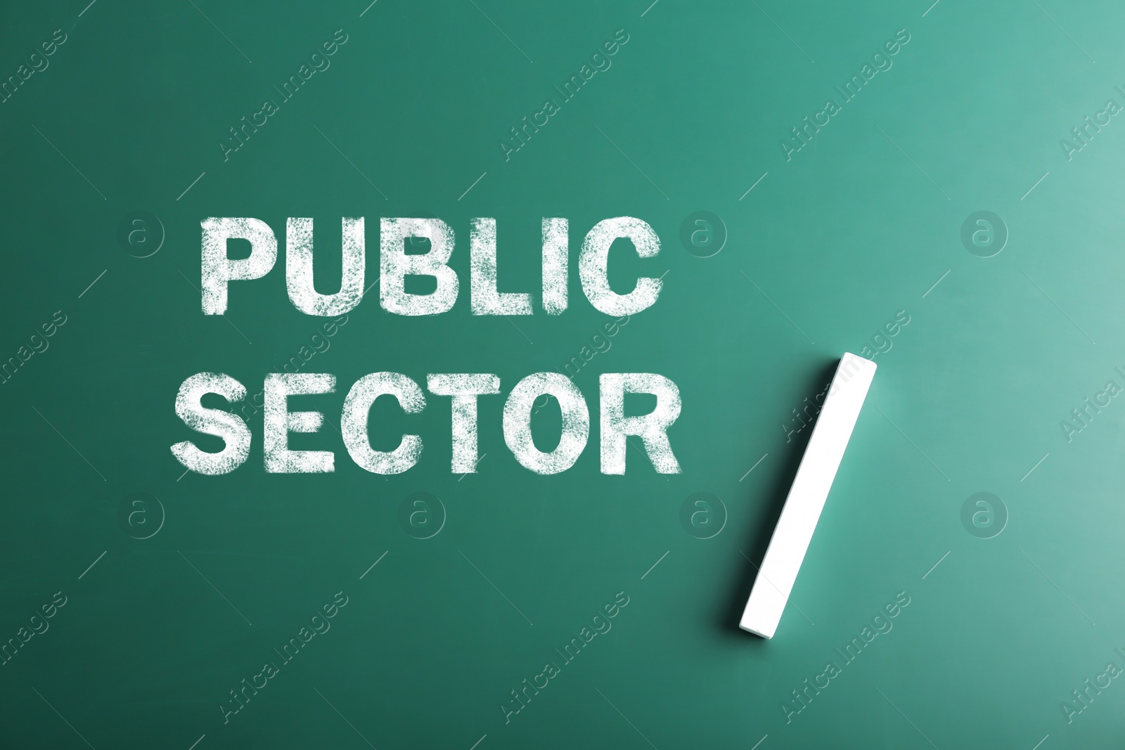 Image of Phrase Public Sector written on green chalkboard, top view