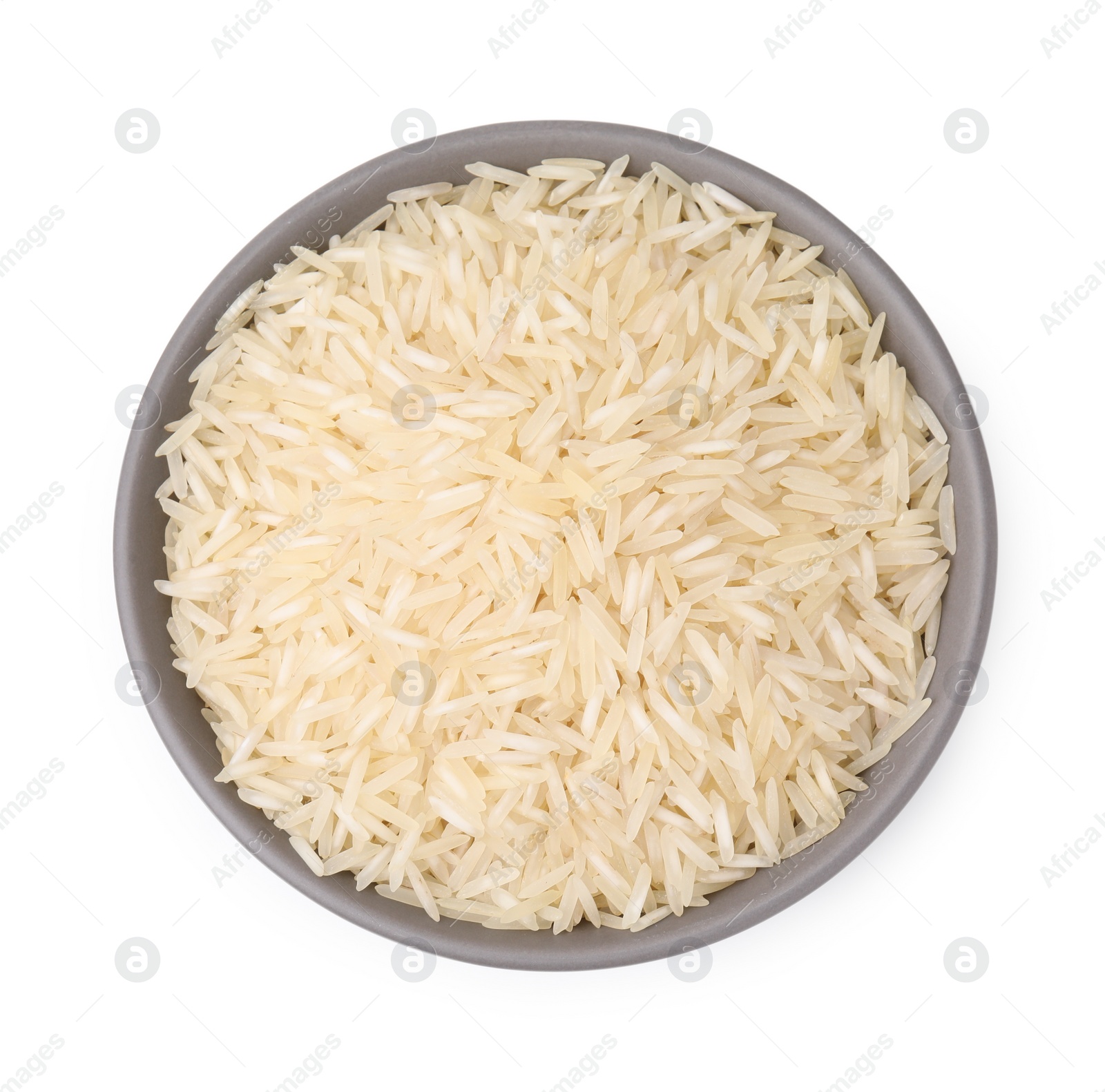 Photo of Raw rice in bowl isolated on white, top view