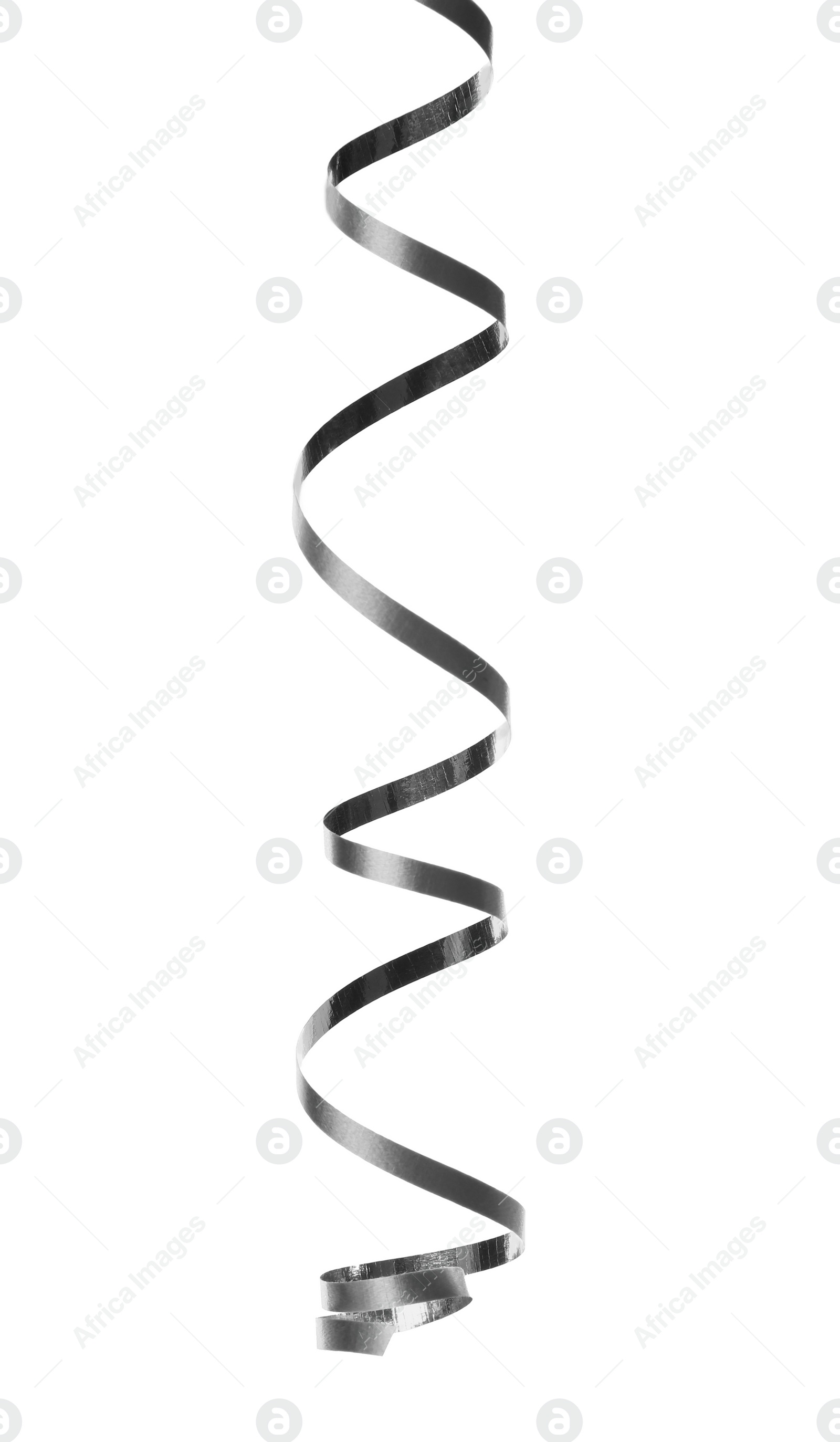 Photo of Shiny silver serpentine streamer on white background