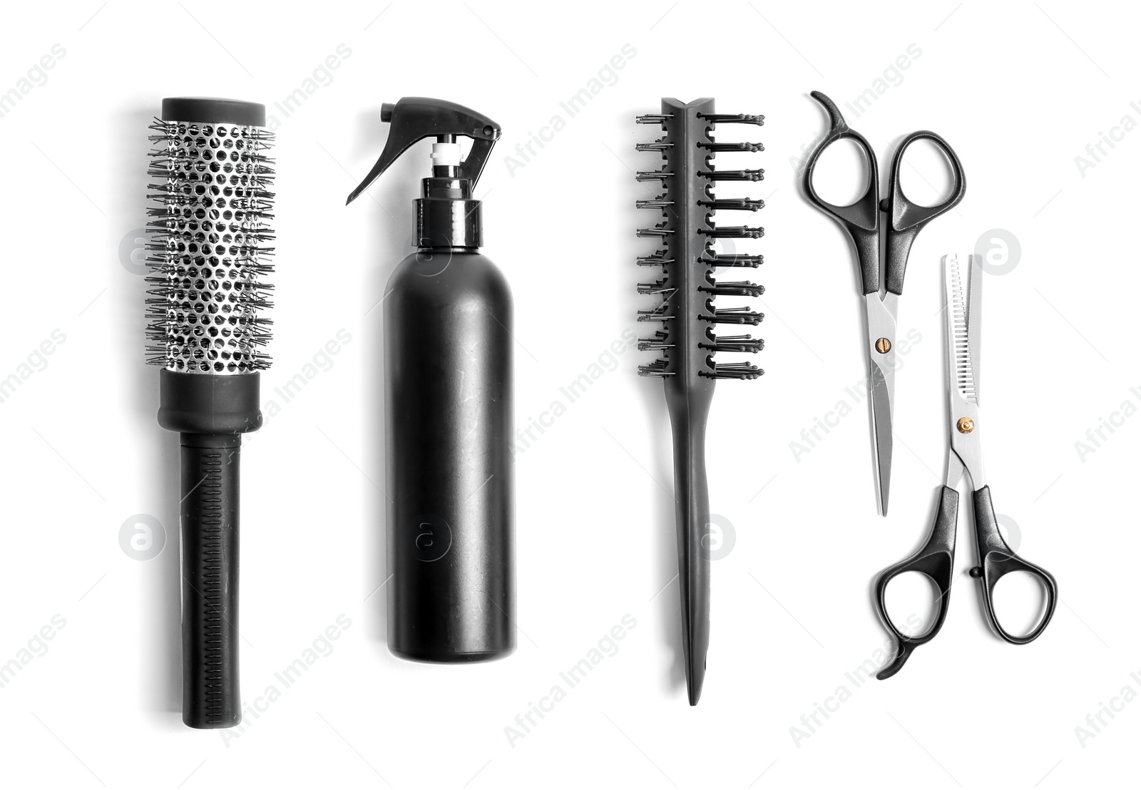 Photo of Professional hairdresser tools on white background