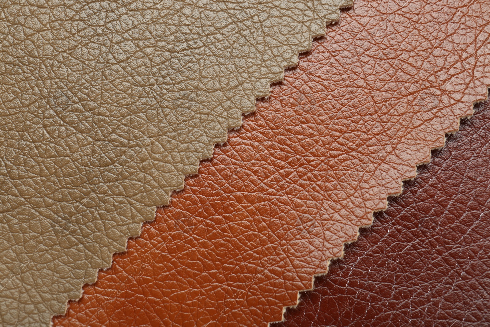 Photo of Texture of different leather as background, top view