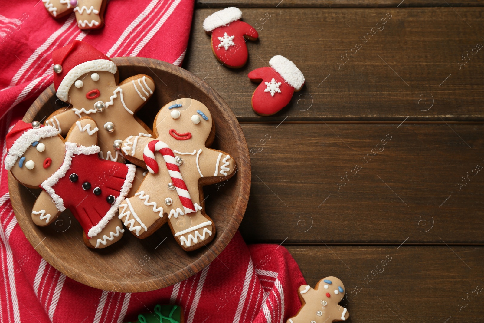 Photo of Delicious Christmas cookies on wooden table, flat lay. Space for text