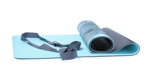 Photo of Light blue camping mat with strap isolated on white
